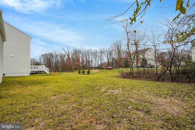 view of yard featuring a deck