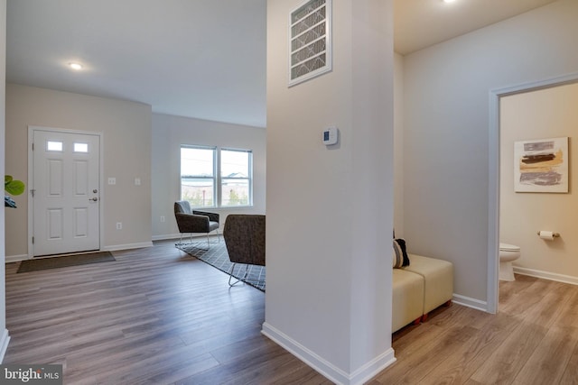 foyer with light wood-type flooring