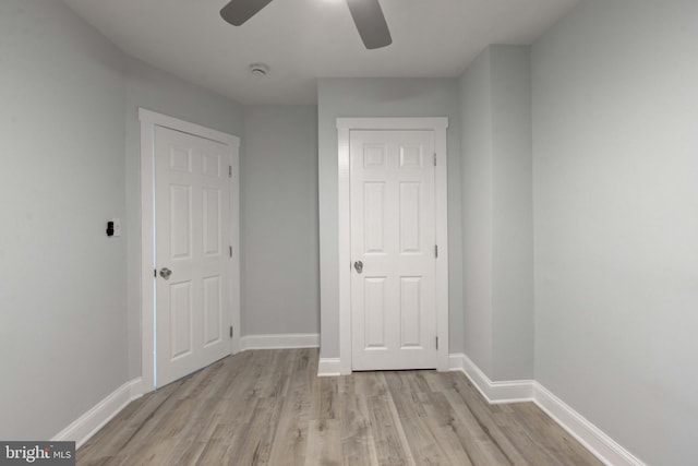 interior space with ceiling fan and light wood-type flooring