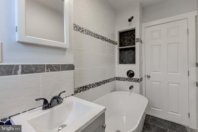 bathroom featuring tile walls and vanity