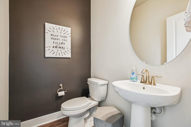 bathroom with sink and toilet