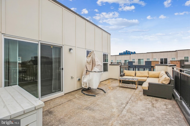 view of patio / terrace featuring a balcony and an outdoor living space