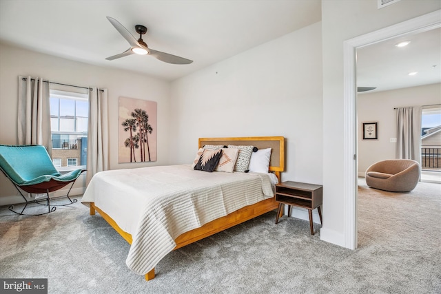 bedroom with ceiling fan and carpet flooring