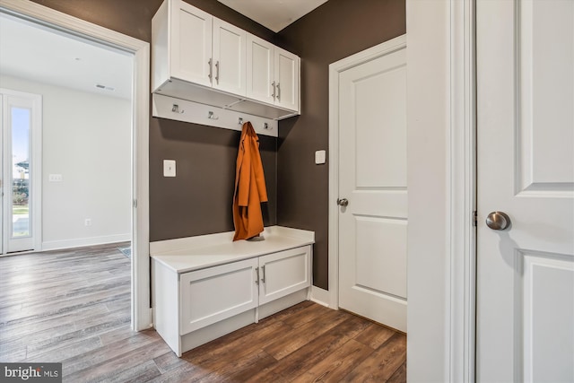 mudroom with dark hardwood / wood-style floors