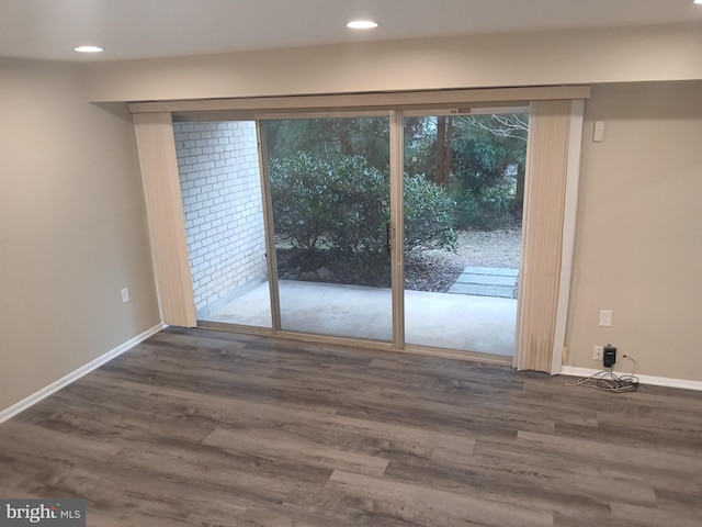 interior space with dark hardwood / wood-style floors