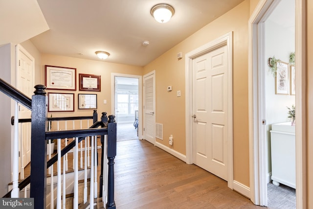 hall featuring hardwood / wood-style floors