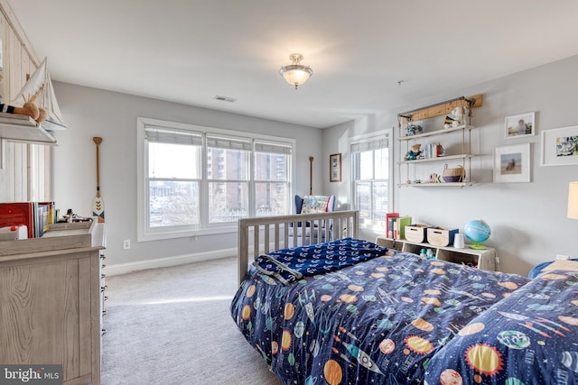 bedroom with light carpet