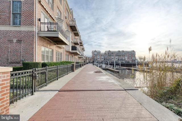 view of home's community with a water view