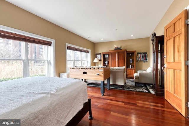 bedroom featuring dark wood-type flooring