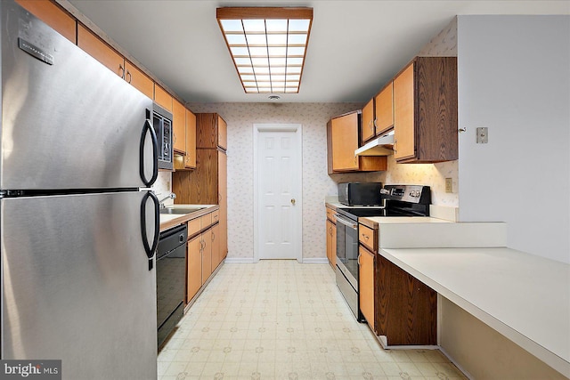 kitchen with sink and stainless steel appliances