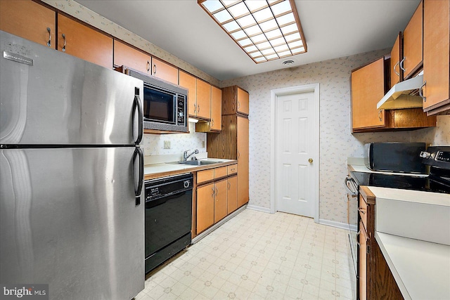 kitchen with sink and black appliances