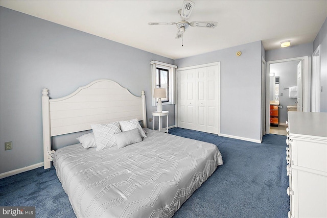 bedroom with ceiling fan, a closet, and dark colored carpet