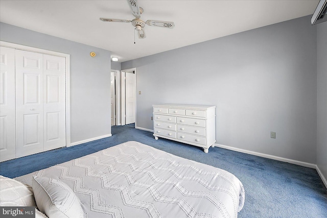 carpeted bedroom featuring ceiling fan and a closet