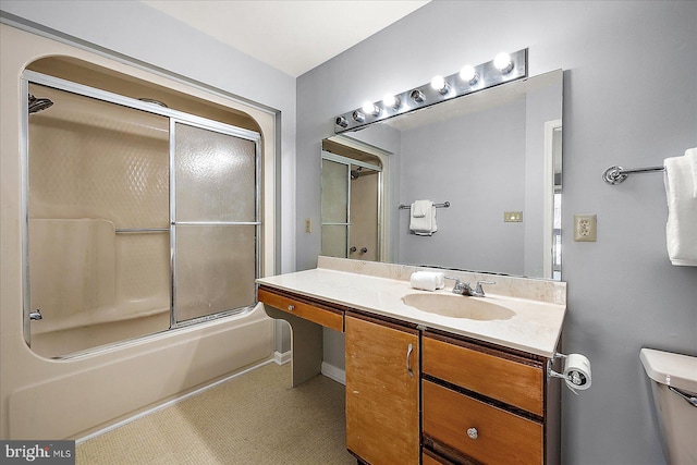 full bathroom featuring vanity, toilet, and enclosed tub / shower combo