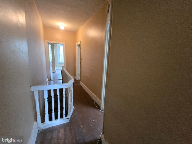 corridor with a textured ceiling