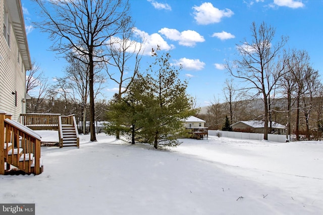 view of yard covered in snow