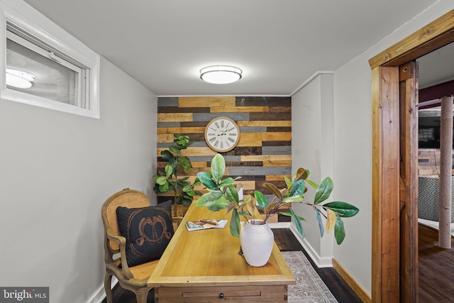 office area featuring wooden walls