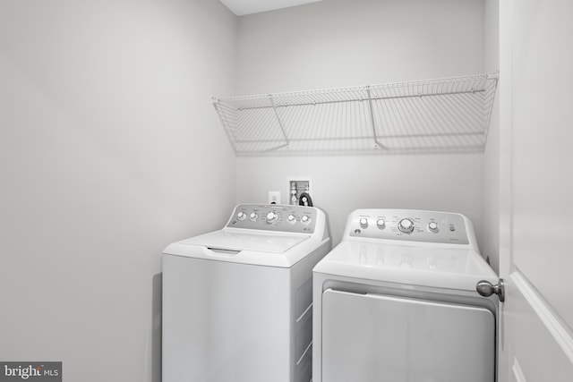 laundry room featuring washer and dryer