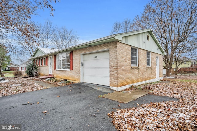 view of side of property featuring a garage