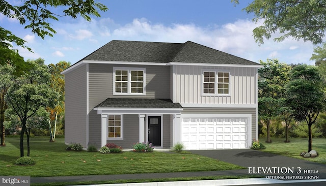 view of front facade with a front yard and a garage