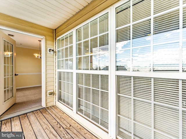 exterior space featuring a chandelier