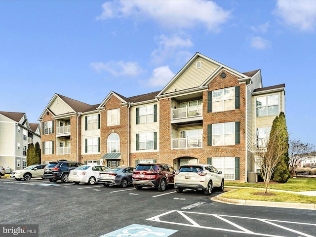 view of property with central AC unit