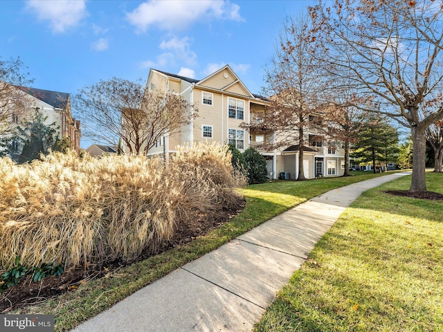 surrounding community featuring a yard