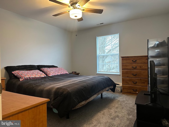 carpeted bedroom featuring ceiling fan