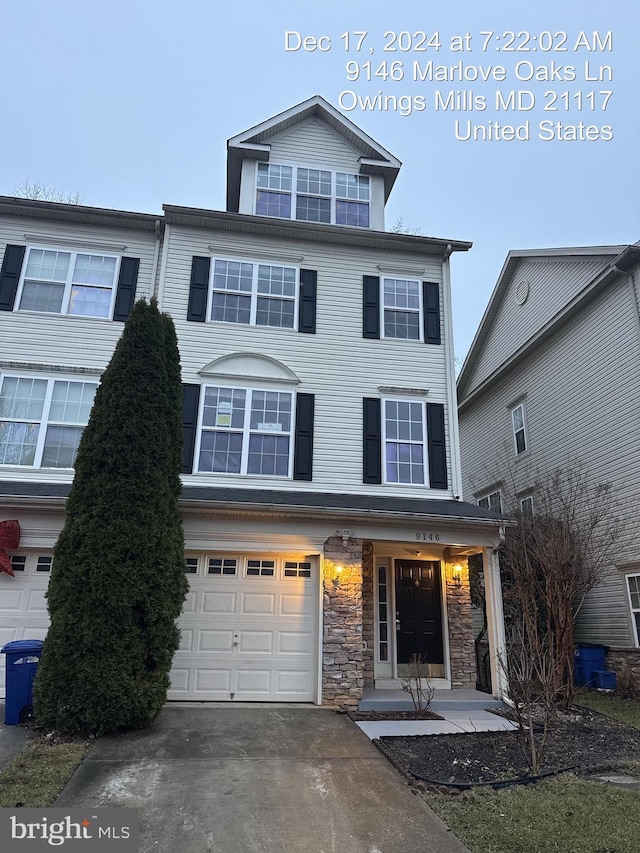 view of front of property with a garage