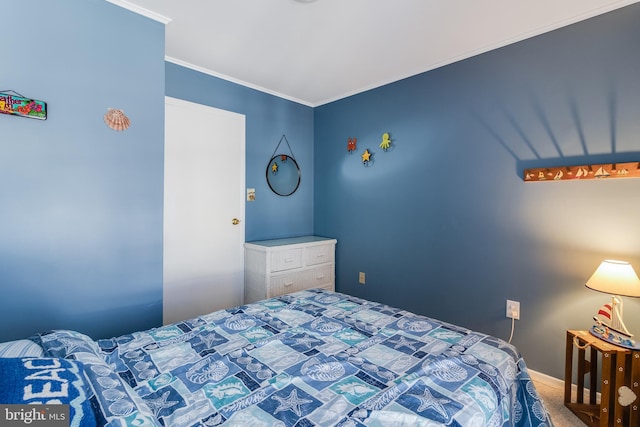 carpeted bedroom with crown molding