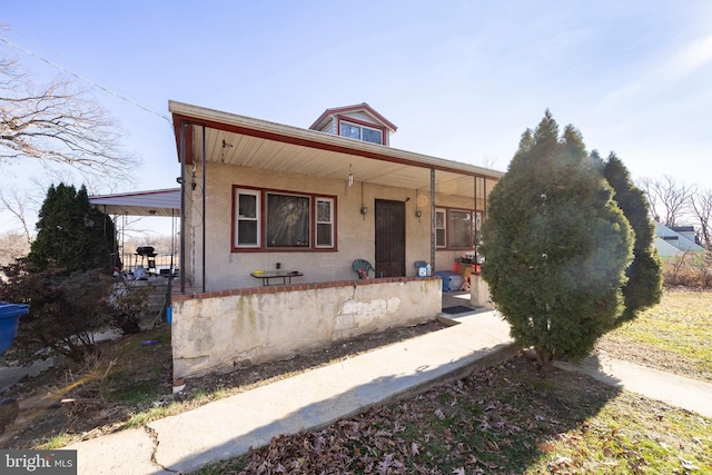 view of front facade featuring covered porch