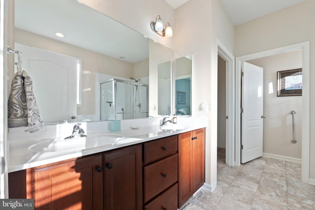 bathroom with vanity and walk in shower