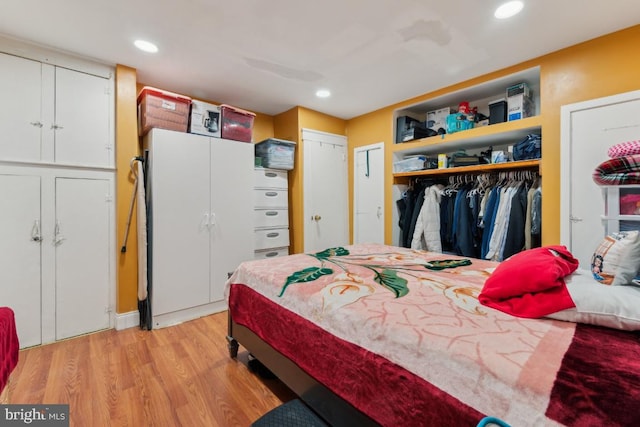 bedroom featuring light wood-type flooring