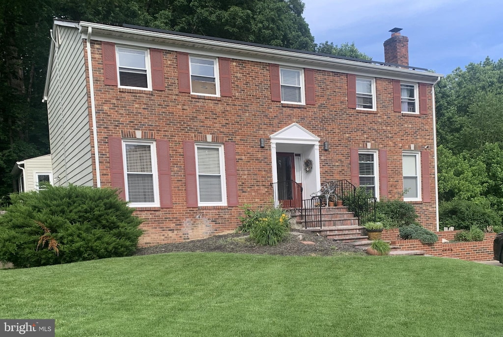 colonial house with a front yard