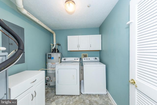 clothes washing area featuring cabinets, a textured ceiling, washing machine and dryer, and gas water heater