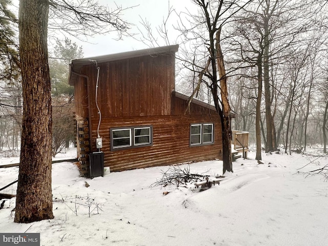 view of snow covered property