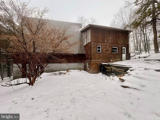 view of snow covered house