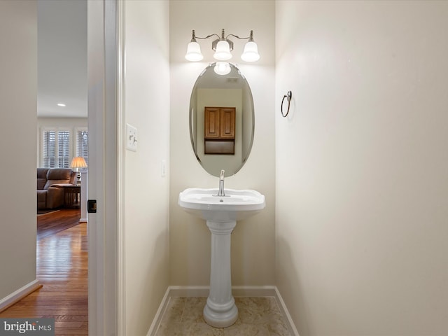 bathroom featuring hardwood / wood-style flooring