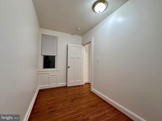 hall featuring dark hardwood / wood-style floors