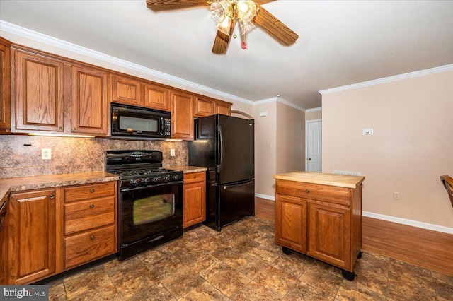 kitchen with backsplash, ceiling fan, black appliances, and ornamental molding