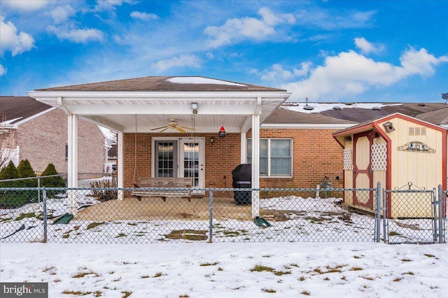 view of front of house featuring ceiling fan and a porch