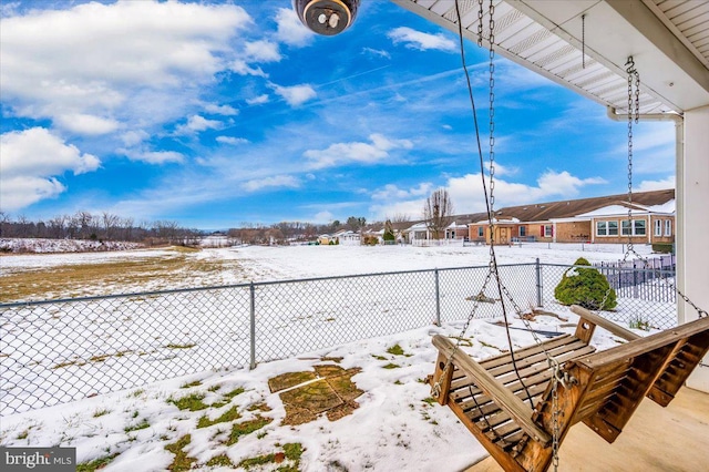 view of yard covered in snow