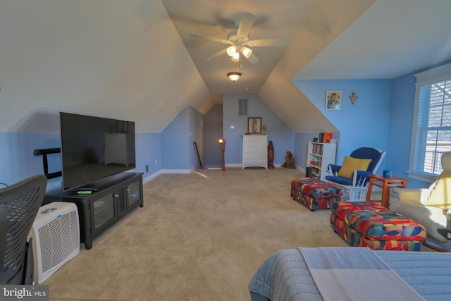 interior space featuring light carpet, ceiling fan, and lofted ceiling