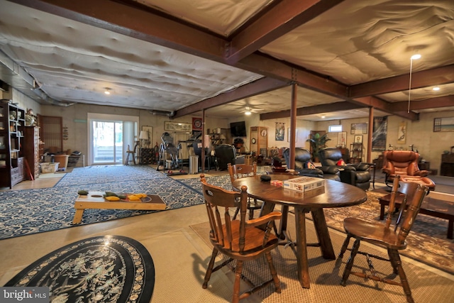 dining room featuring beamed ceiling and ceiling fan