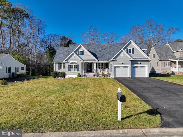 view of front facade featuring a garage and a front lawn