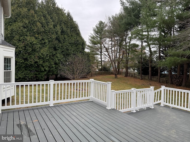 deck featuring a yard