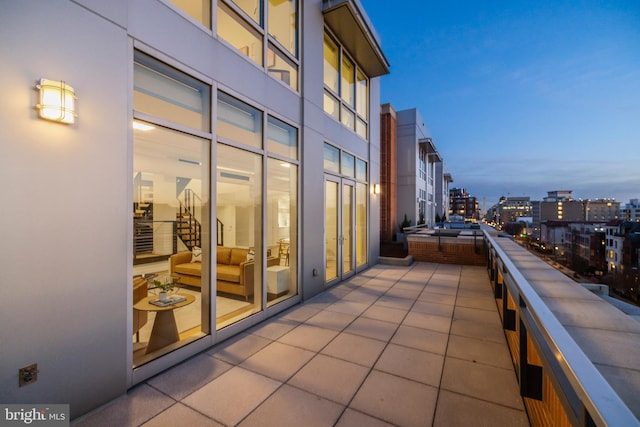 balcony featuring a city view