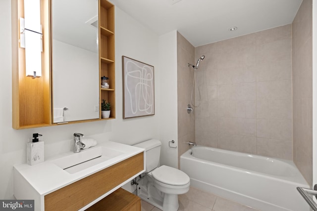 full bathroom featuring tile patterned flooring, tub / shower combination, toilet, and vanity