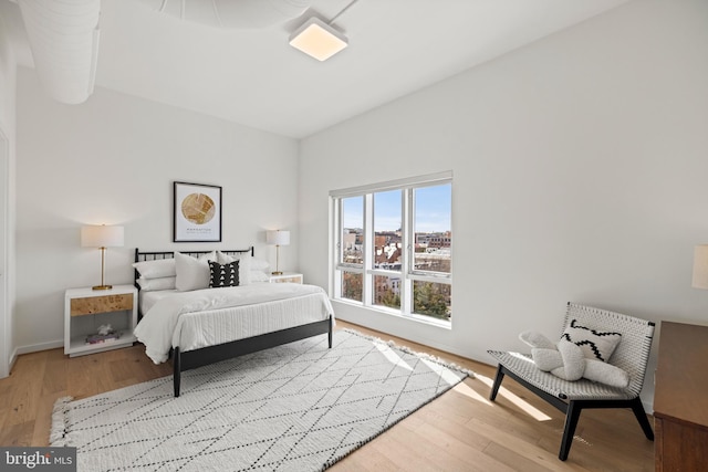 bedroom with wood finished floors