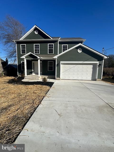 front facade with a garage